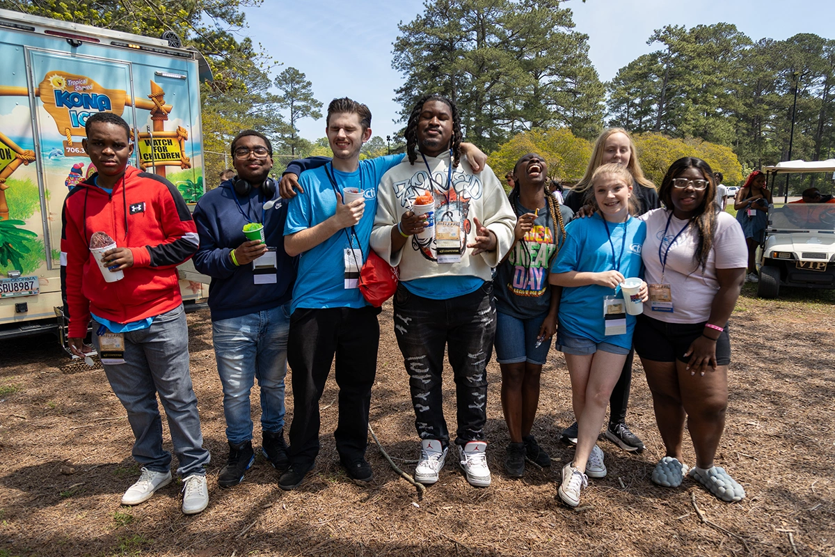 group of students in casual clothes in an outdoor setting